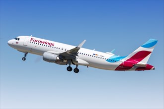 A Eurowings Airbus A320 with the registration D-AEWF takes off from Stuttgart Airport