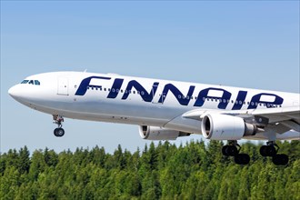 A Finnair Airbus A330-300 with the registration OH-LTN lands at Helsinki Airport