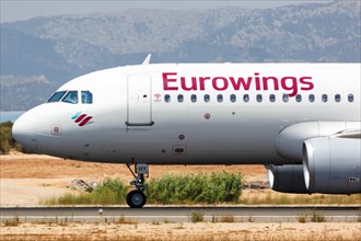 A Eurowings Airbus A320 with registration D-AIZT lands at Palma de Majorca Airport