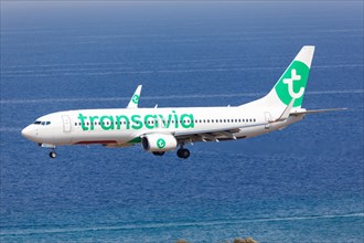 A Transavia Boeing 737-800 with the registration PH-HXE lands at Rhodes airport