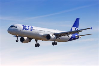 A Joon Airbus A321 with the registration F-GTAK lands at Barcelona Airport
