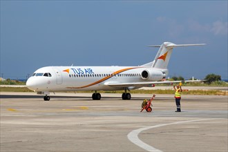 A Fokker 100 of Tus Air with the registration 5B-DDE at the airport of Rhodes