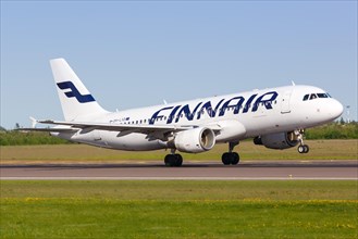 A Finnair Airbus A320 with the registration OH-LXD takes off from Helsinki Airport