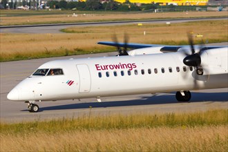 A Bombardier DHC-8-400 of Eurowings with the registration D-ABQO at Stuttgart Airport
