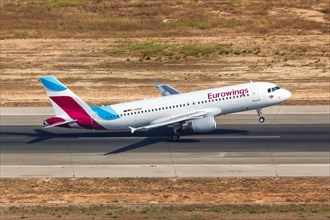 A Eurowings Airbus A320 with the registration D-ABNH takes off from Palma de Majorca Airport