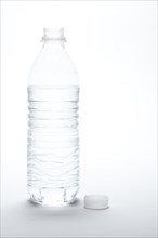 Water bottle and cap image on A gradated white background