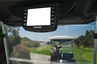 Nside of golf cart with GPS system blank and ready for your own message