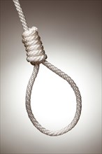 Hangman's noose on a spot lit background