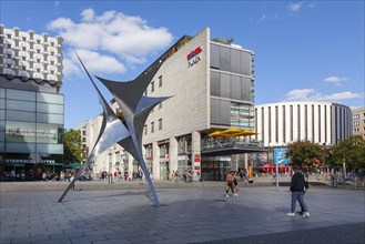 Pedestrian zone Prager Strasse with sculpture Voelkerfreundschaft and round cinema