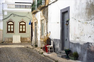 Narrow street of historic fishermen's town called Olhao