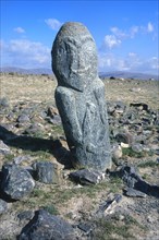 Ancient stone stele of a Turkic warrior or Balbal near Khurgan Lake