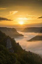 View from Eichfelsen to Werenwag Castle with morning fog