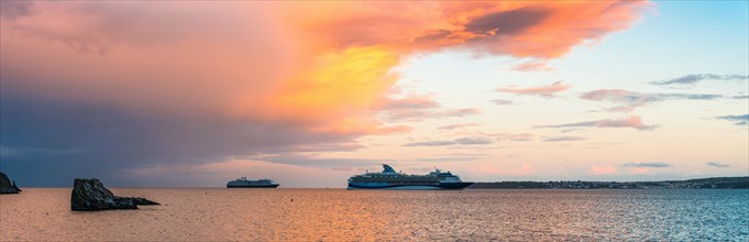 Sunset over Cruise ferries in Torquay