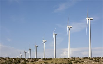 Dramatic wind turbine farm in the desert of California