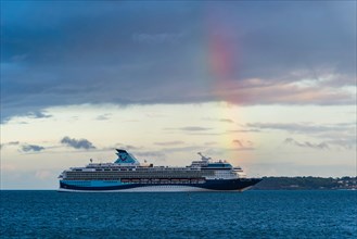 Sunset and Rainbow over Cruise ferries in Torquay
