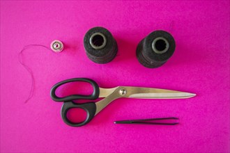 Black tailoring accessories as scissors