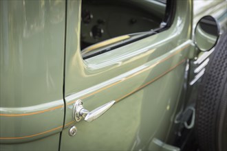 Detail abstract of beautiful vintage car door and handle