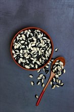 Dried beans in shell with spoon