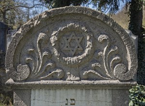Relief with wreath and Star of David on a Jewish gravestone