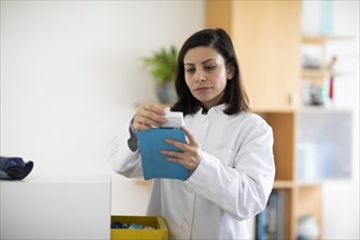 Pharmacist working with medicine in a pharmacy