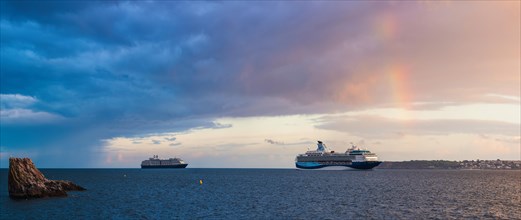 Sunset and Rainbow over Cruise ferries in Torquay