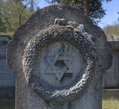 Relief of a wreath with Star of David on a Jewish gravestone
