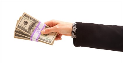 Woman handing over hundreds of dollars isolated on a white background