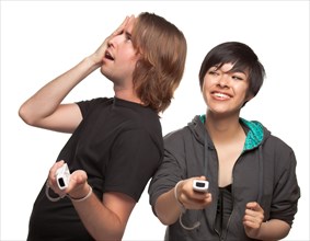 Diverse couple with video game controllers having fun isolated on a white background