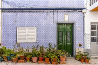 A house with traditional Portuguese tiles in Olhao