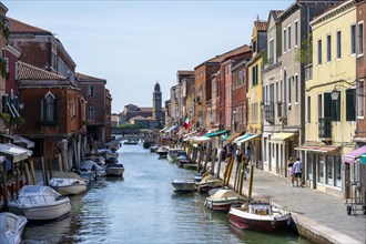 Houses and boats on the channel of Murano