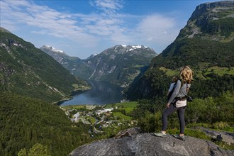 Mother with child overlooking Geirangerfjord