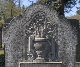 Relief of stillized flowers on a Jewish gravestone