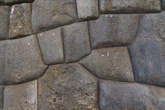 Precise stone setting in the ramparts of the Inca ruins Sacsayhuaman