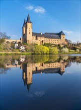 Rochlitz Castle reflected in the river Zwickauer Mulde