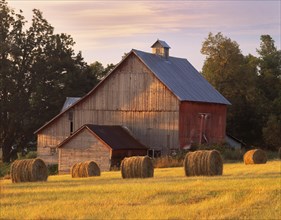 Barn and round hay bales in North Hero