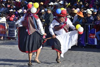 Two dancers at the parade on the eve of Inti Raymi