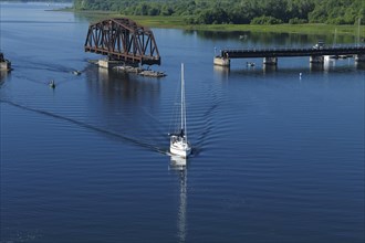 A boat near the railway bridge