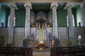 Transverse interior with mighty pulpit wall