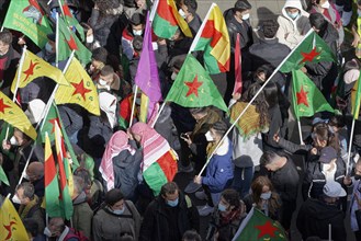 Kurdish protesters with flags