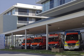 Rescue service vehicles waiting at the emergency room