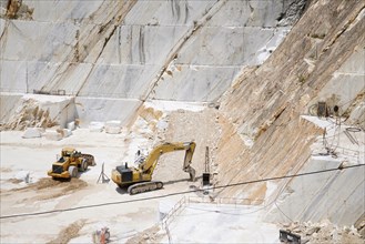 Terraced rock face in open pit Carrara marble mines or quarries