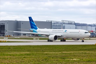An Airbus A330-900neo of Garuda Indonesia with the registration F-WWCD at Hamburg Finkenwerder Airport