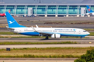A Boeing 737-800 aircraft of Xiamenair with registration number B-1708 at Guangzhou airport