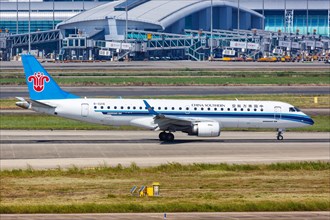 A China Southern Airlines Embraer 190 aircraft with registration number B-3216 at Guangzhou Airport