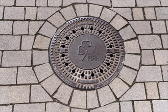 Manhole cover with the cloverleaf
