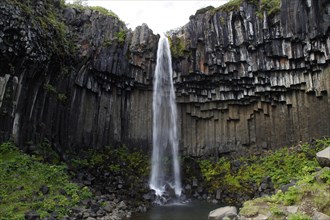 Columnar basalt with waterfall