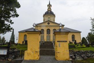The Alatornio church exterior in and a point in the Unesco world heritage site Struve Geodetic Arc