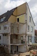 A half-demolished house