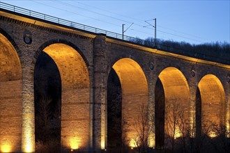 Illuminated viaduct in the evening
