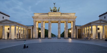 Illuminated Brandenburg Gate in the morning